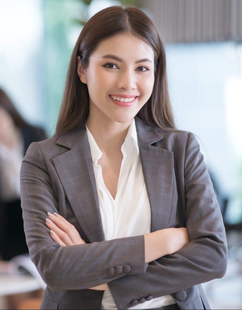 Portrait of successful young asian businesswoman at office